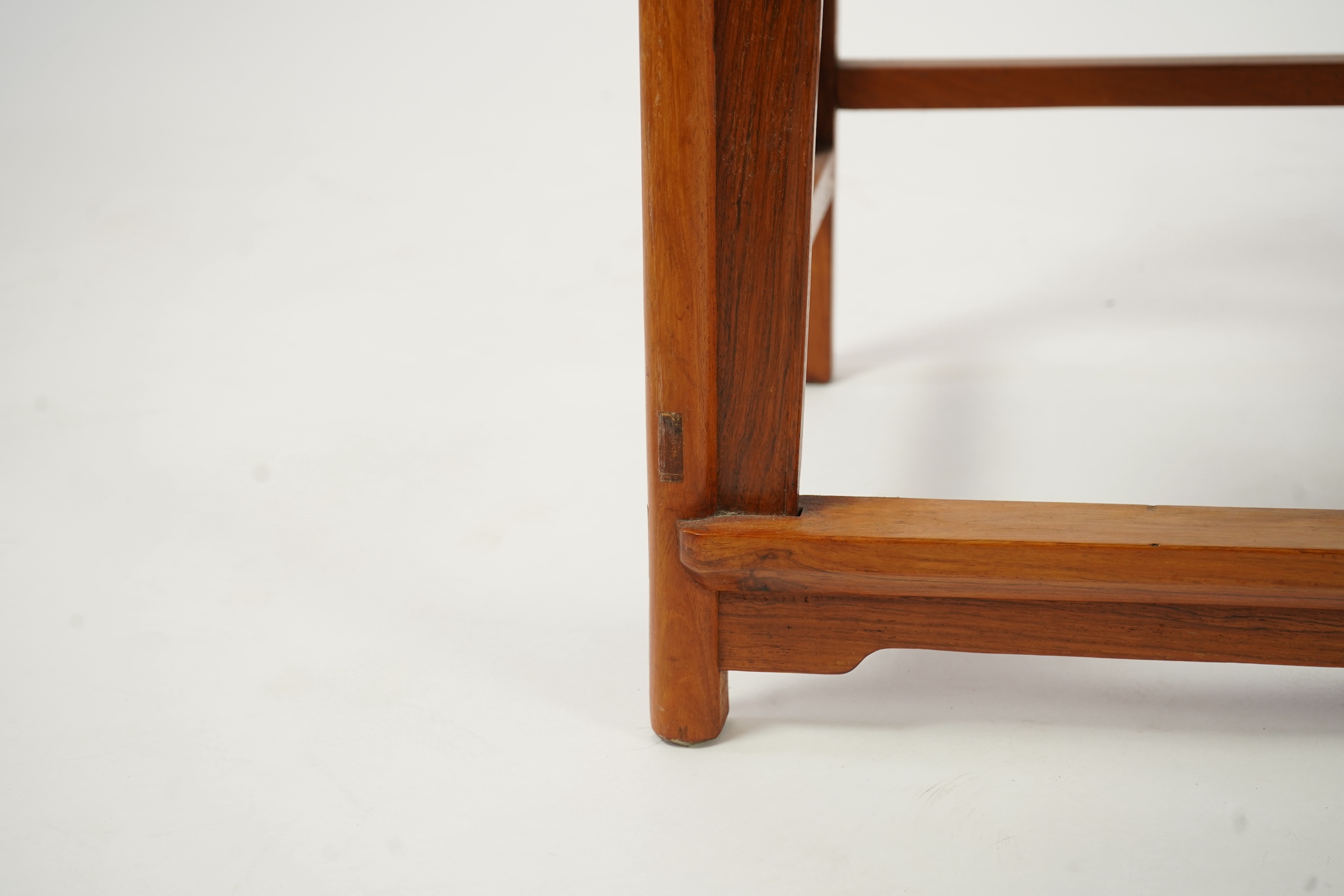 A Chinese huanghuali and brass mounted horseshoe-back armchair, quanyi, late 19th century
